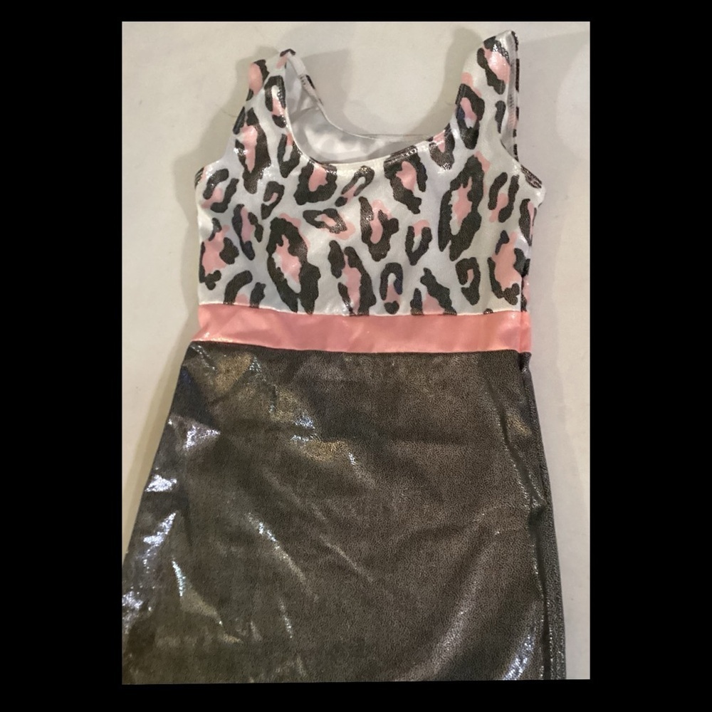 Little girl, gymnastics outfit. 10